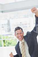 Businessman cheering