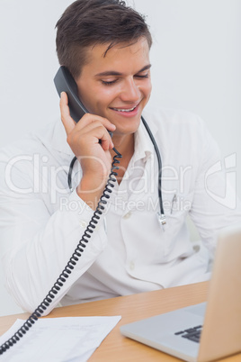 Attractive doctor on the phone