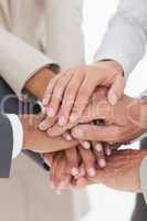 Business teams hands together