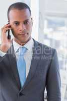 Serious businessman on a call