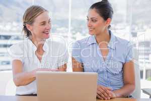 Businesswomen working with laptop