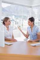 Businesswomen arguing in the office