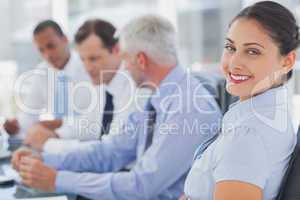 Attractive businesswoman posing in the meeting room