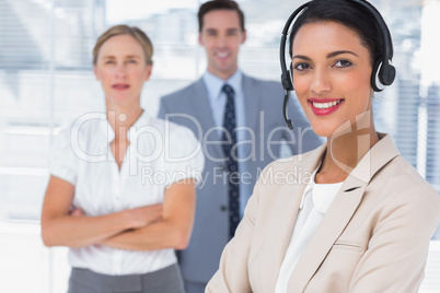 Attractive woman with headset crossing her arms