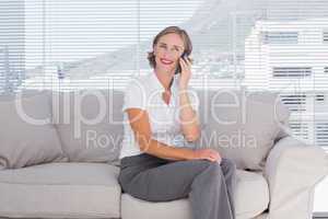 Pretty businesswoman talking on phone