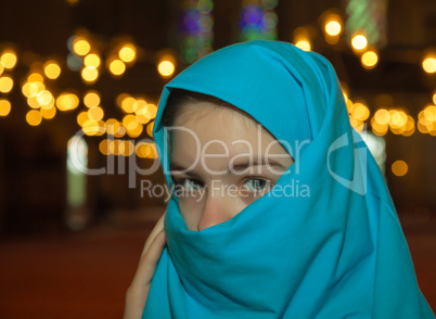 Teen muslim girl at a mosque