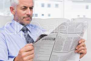 Businessman reading the news