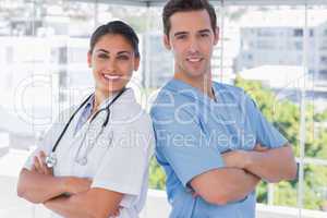 Medical staff standing with arms crossed