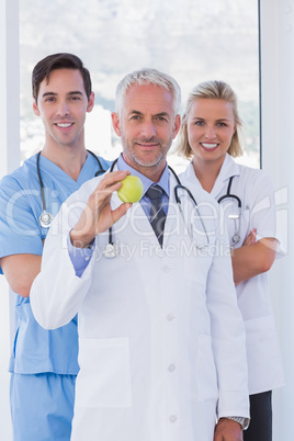 Cheerful medical staff standing together