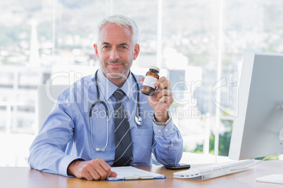 Doctor holding medicine jar