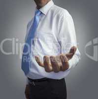 Businessman presenting his empty hand
