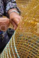 man making a wicker basket