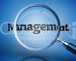 Magnifying glass above the word management