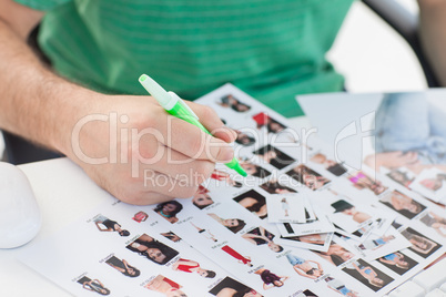 Photo editor marking contact photographs