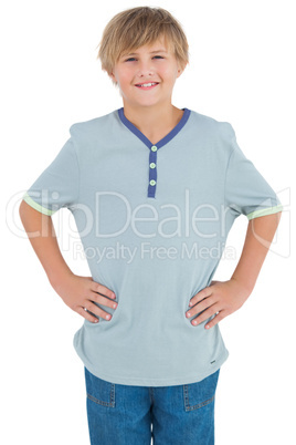 Young child with a blue shirt smiling