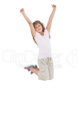 Little girl jumping and putting her hands up