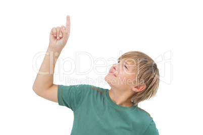 Boy raising his finger and looking up