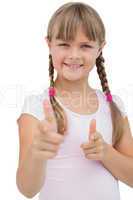 Pretty blonde girl giving thumbs up