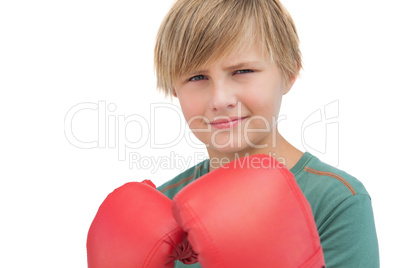Smiling boy with boxing gloves