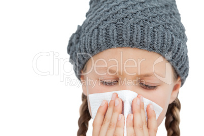 Sick little girl with an handkerchief