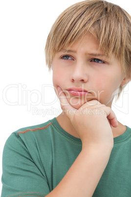 Young boy thinking about something