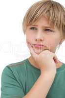 Young boy thinking about something