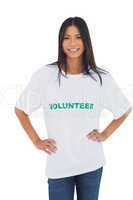 Cheerful woman wearing volunteer tshirt