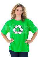Environmental activist wearing green shirt with recycling symbol