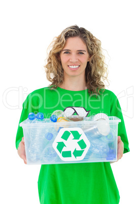 Smiling activist holding recycling box