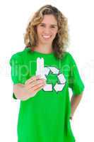 Cheerful environmental activist holding a light bulb