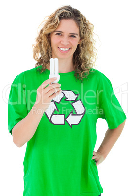 Environmental activist holding a light bulb