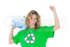 Cheerful environmental activist holding box of recyclables