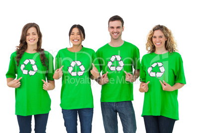 Group of environmental activists pointing their tshirt