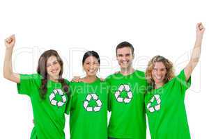 Smiling group of environmental activists raising arms