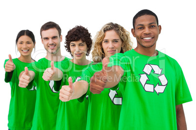 Smiling group of environmental activists giving thumbs up