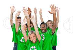 Group of environmental activists raising arms