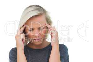 Attractive woman having a headache
