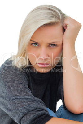 Troubled woman looking at camera