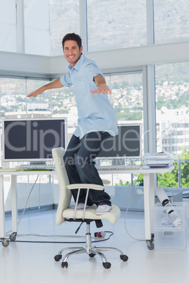 Creative designer surfing his swivel chair