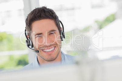 Happy designer having an online communication