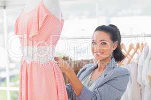 Fashion designer working on dress