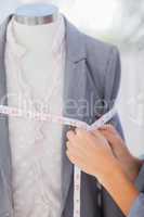 Designer measuring blazer