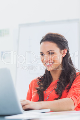 Attractive designer sitting at her desk