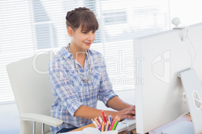 Designer working on her computer