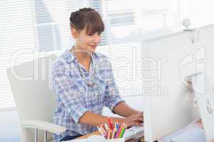 Designer working on her computer