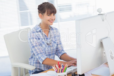 Portrait of a designer working on her computer