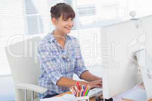 Portrait of a designer working on her computer