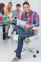 Attractive designer sit in his office