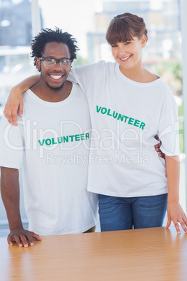 Volunteers embracing each other