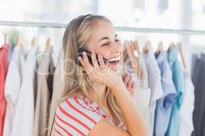 Woman standing in a clothing store